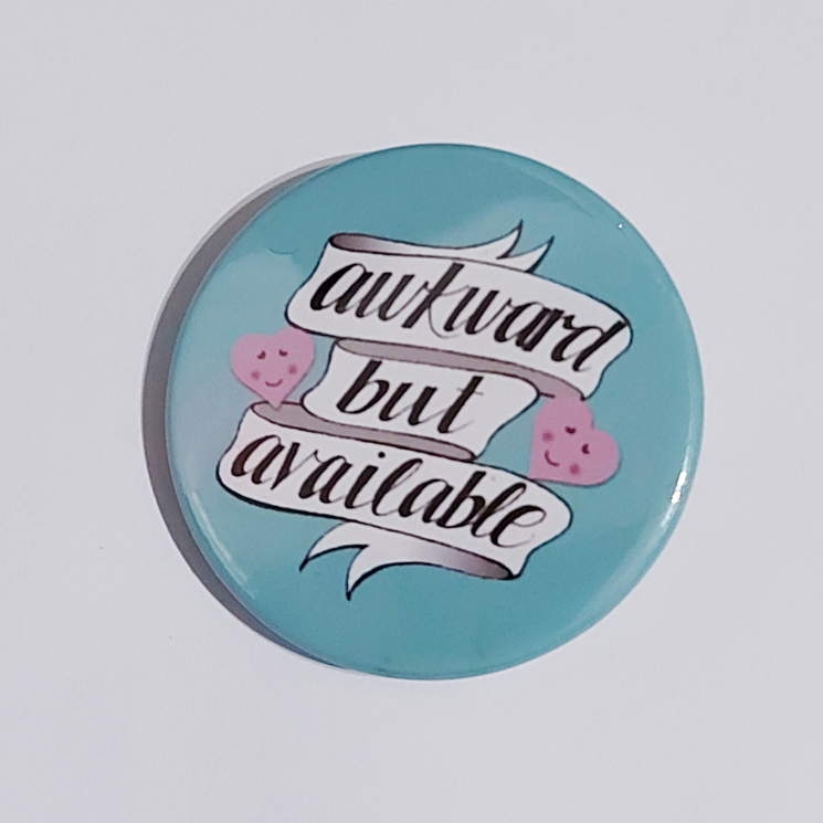 Badge with a teal background that reads "awkward but available"