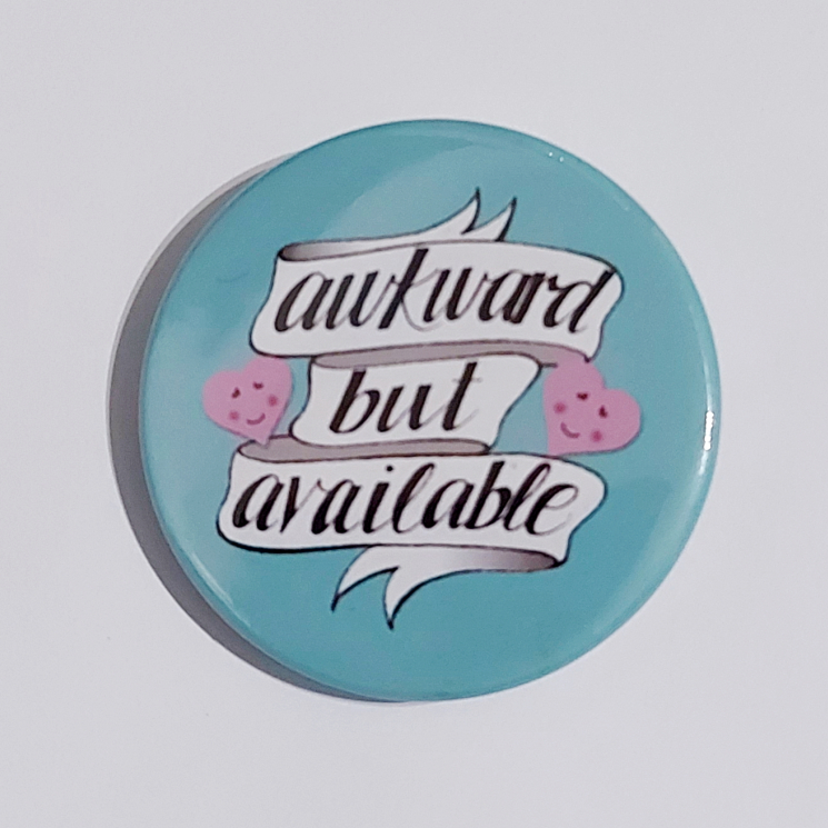 Badge with a teal background that reads "awkward but available"