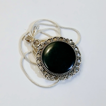 Round Silver pendant with black resin stone