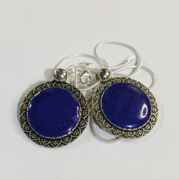 Silver pendant with violet stone